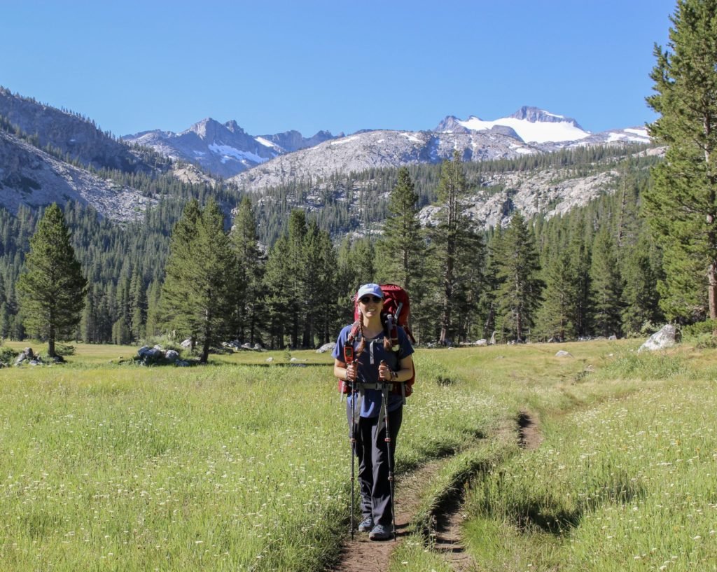 Woman backpacking in the mountains