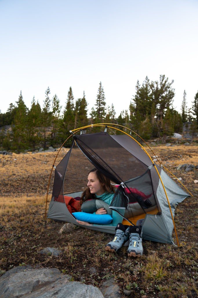 woman inside a tent