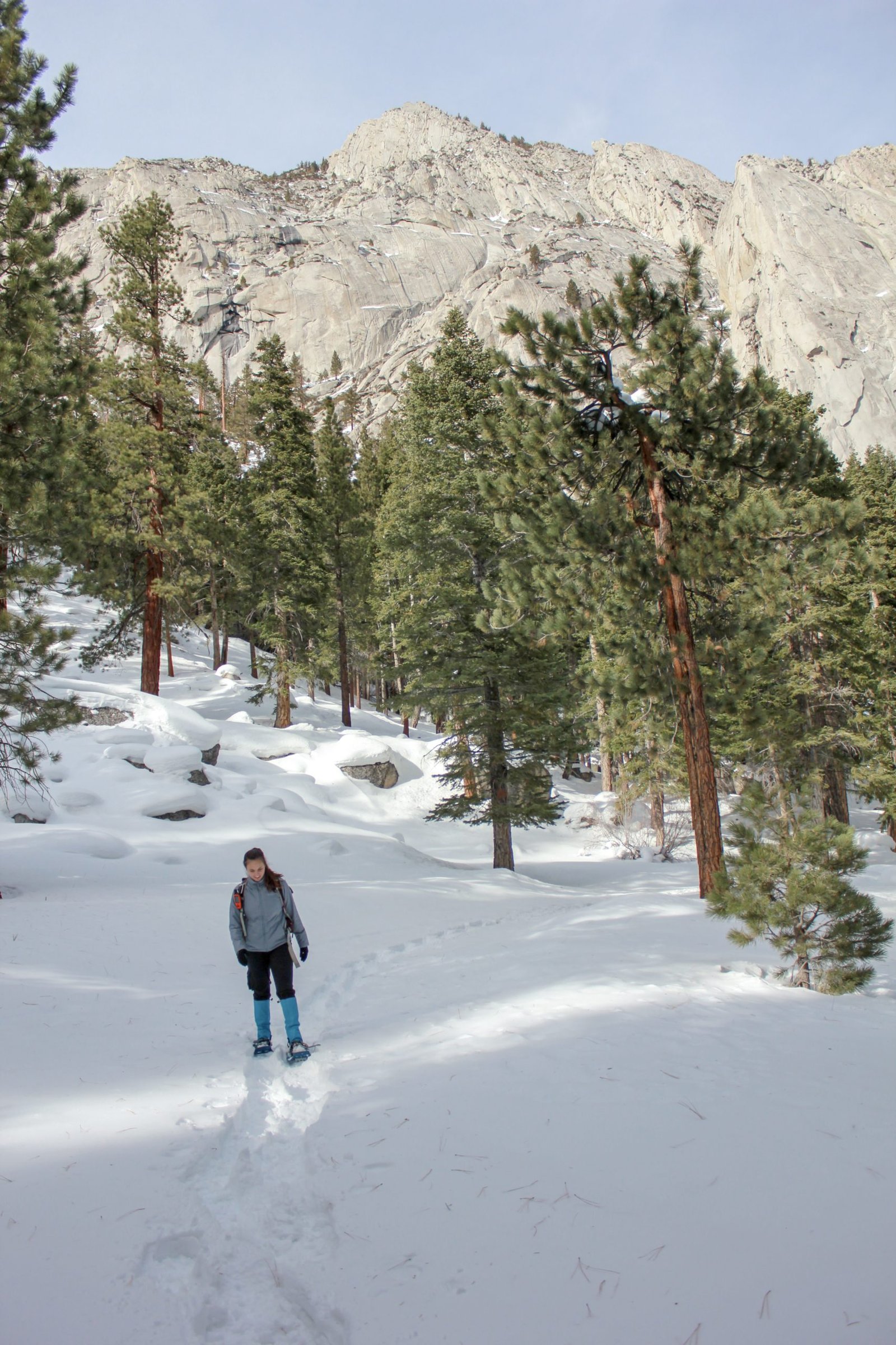 woman starting to snowshoe