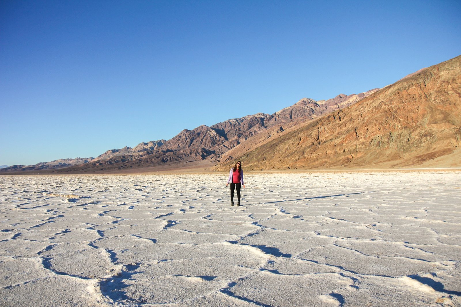 woman standing in salt flats in Death Valley