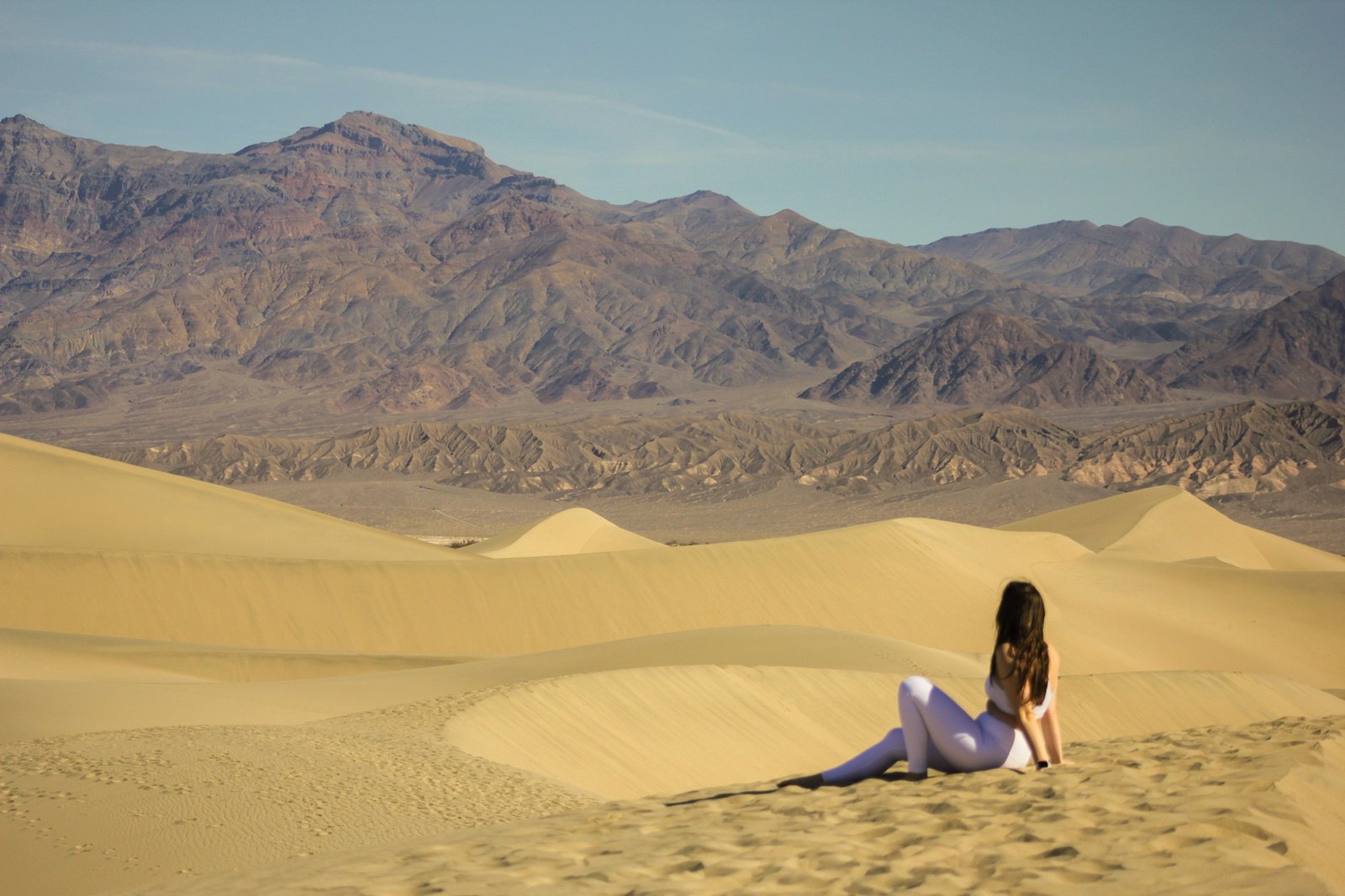 woman staring at the mountains in Death Valley National Park