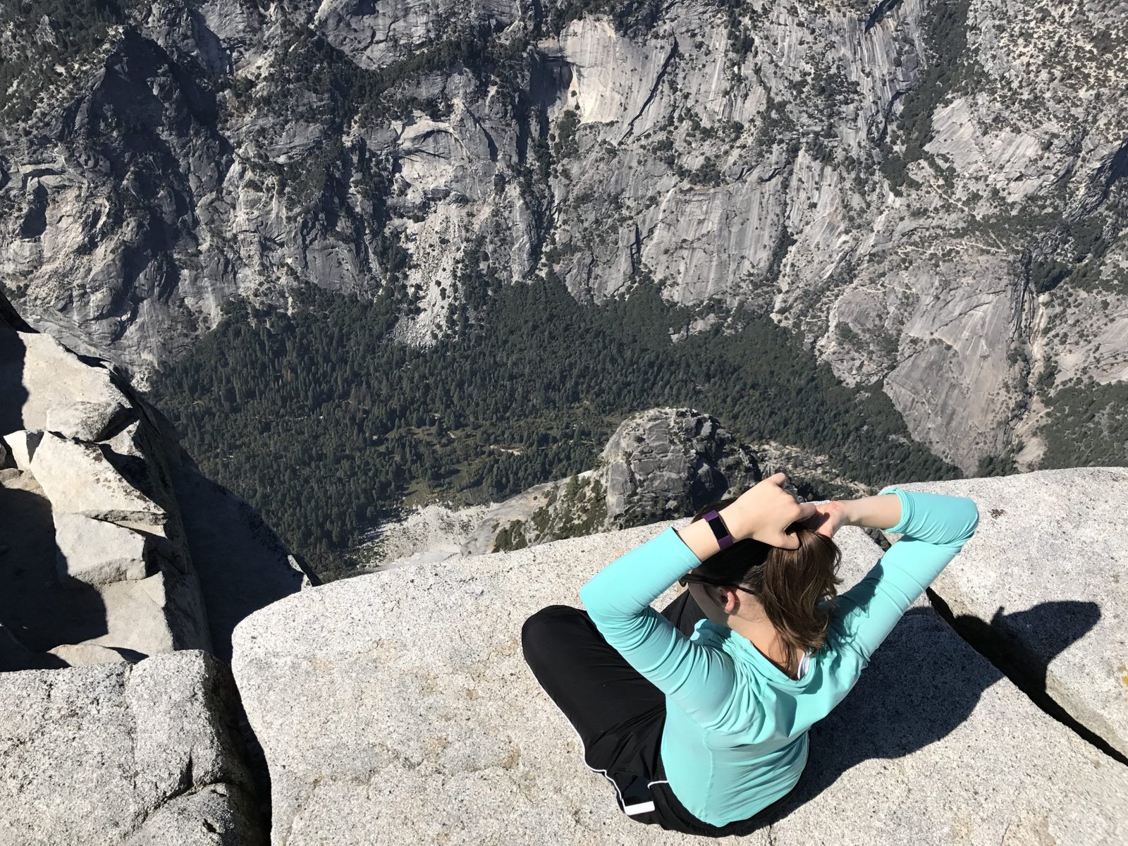 Photo of woman at Half Dome in Yosemite